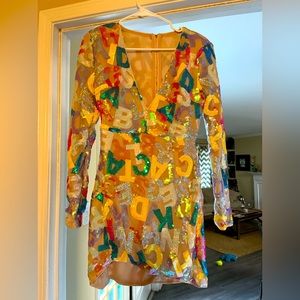 Queen of sparkles size medium alphabet dress.Brand new!